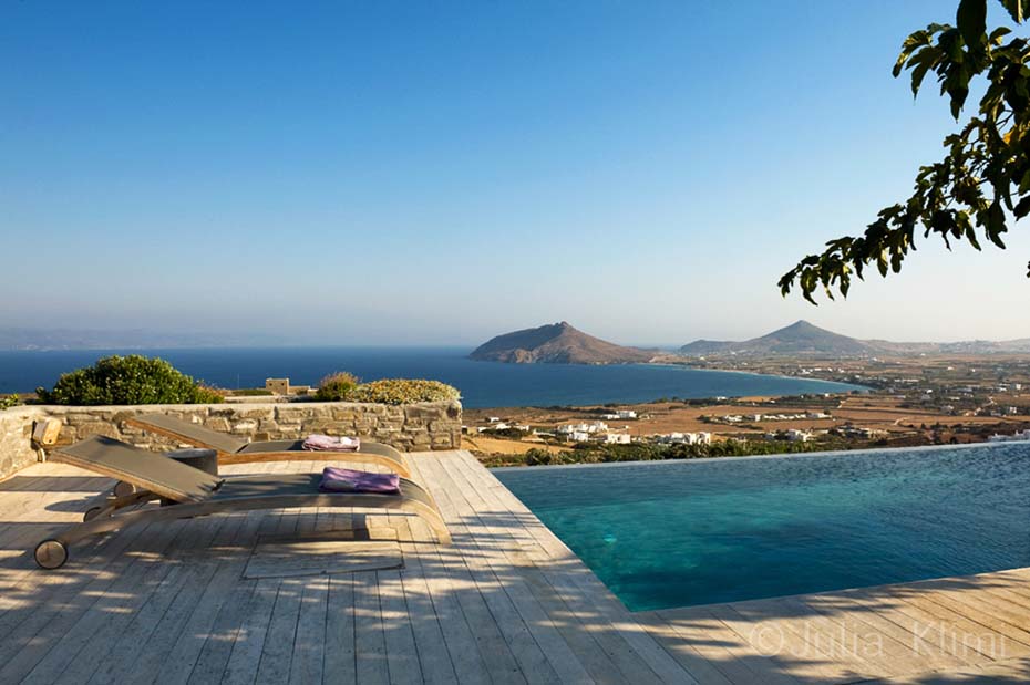 Swimming pool with chez longue in island house